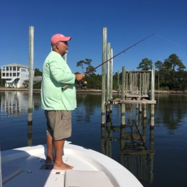 Captain Mike fishing off his boat
